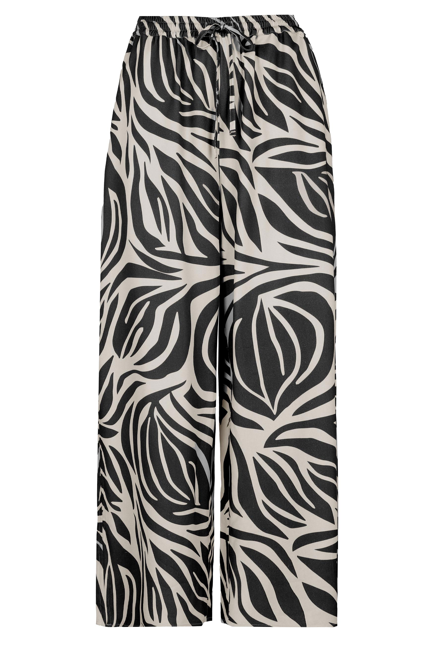 Luźne spodnie z wzorem R-DOLANA